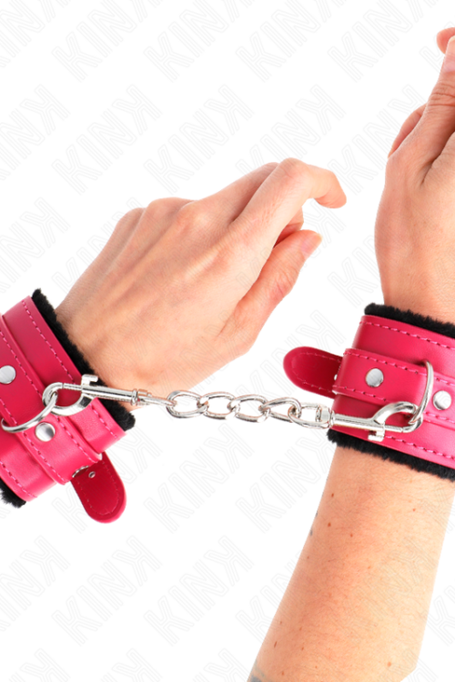 KINK – MUÑEQUERAS FORRADAS PREMIUM NEGRO CON CORREA FUCSIA AJUSTABLE 17-29 CM X 6 CM